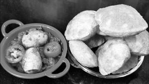 Poori (4nos) + Egg Roast 1