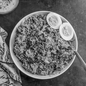 Boiled Egg With Chicken Dum Biryani