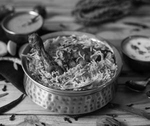 Lucknowi Chicken Dum Pukht Biryani
