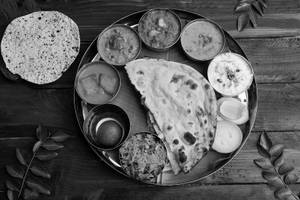 Includes 2 Rotis, Dal, Soup, Sweet, Rice, Papad, 2 Sabzi
