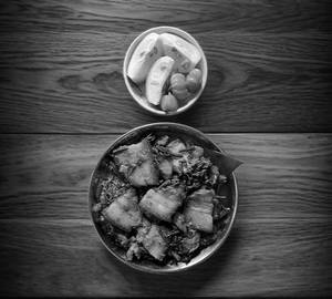 Pork with dhekia xaak [5 pieces]