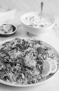 Tandoori Paneer Biryani Served With Curd + Salad