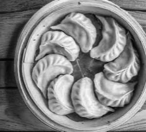 Deluxe Veg Momo Full 10 piece's serve with ketchup and red chilli