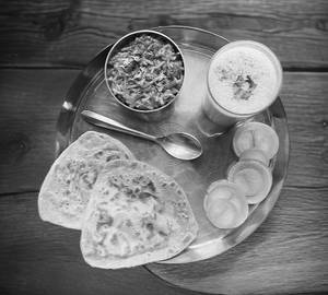 Sev Tamatar & Roti Thali