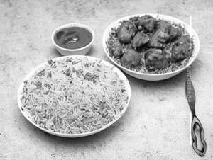 Triple Takkar Chicken Schezwan Fried Rice
