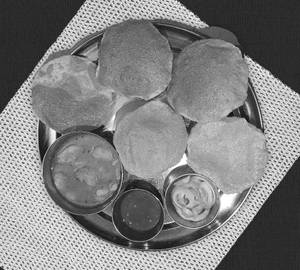 Puri [ 5 pieces] whith aloo tamatar sabzi