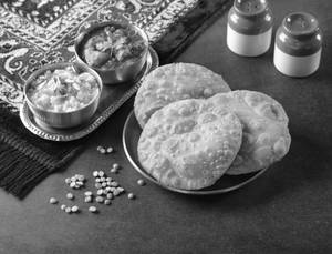 Dal Poori With Aloo Sabji And Halwa