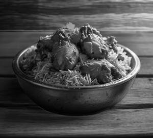 Ghee Roast Chicken Biryani (Full) + 1 Water Bottle 500 Ml + 1 Paper Plate.