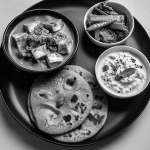 Butter Paneer Masala + Veg Raita + 2 Millet Roti