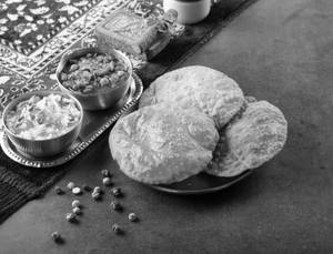 Sattu Poori With Chole And Halwa