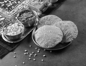 Dal Poori With Chole And Halwa