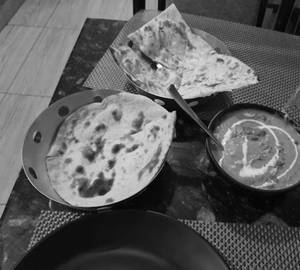 Egg Kolapuri With Two Roti 
