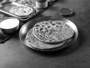 Egg Paratha With Curd & Green Chutney