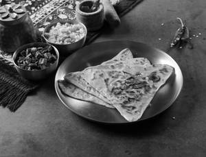 Triangular Paratha With Bhindi Bhujiya & Halwa