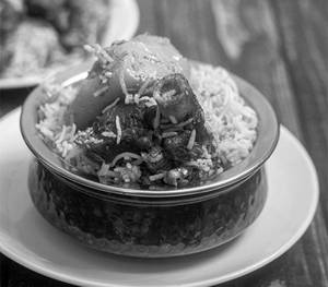 Mutton biryani special [2 piece mutton 1 piece Alu]