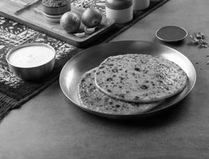 Onion Paratha With Curd & Green Chutney