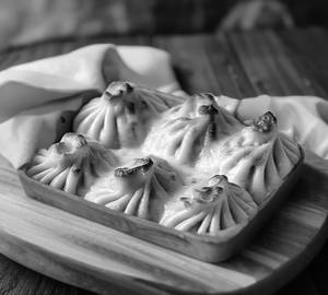Chicken Cheesy Baked Momos