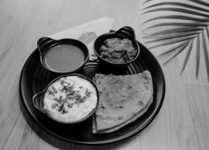 Paneer paratha with curd