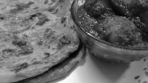 Peas Kulcha  served with white butter and desi achar