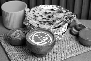 Dal Makhni [ 300 Ml ] + Butter Naan