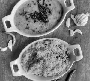 2 Nos. Soft Chapati With Arhar Dal Fry & Refreshing Buttermilk.