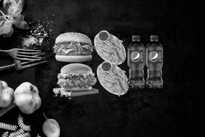 Supper Veggie Burger + Spicy Chi. Burger + 2 Salted Fries + 2 Pepsi