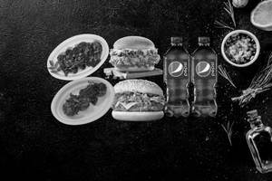 Veg+chi Bhutani Momo + Supper Veg Burger + Spicy Chi. Burger + 2 Pepsi