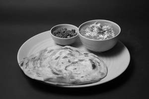 Malabar Paratha With Vegetable Korma And Poiyal