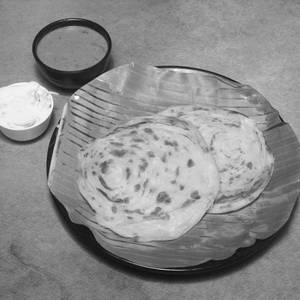 2 Parotta With Veg Gravy