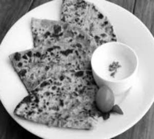 Garlic Paratha with creamy curd Spicy Green Mirchi Achar