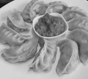 Paneer peri peri  steamed momos