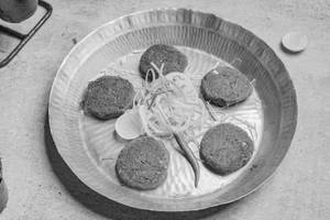 Hare Matar Ke Shikhampuri Kebab   