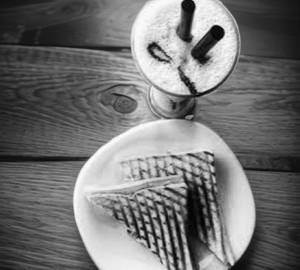 Chocolate grilled sandwich with cold coffee