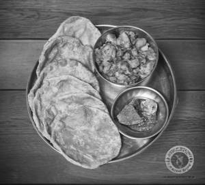 Fried Aloo With 6 Poori And Pickle+Salad