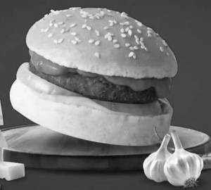 Schezwan cheesy delight burger