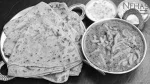 Sev Tamatar With 2 Nos. Tawa Parathas & Butter Milk ( Chaas ) Small Cube Jaggery.