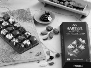 Open Secret-Handcrafted Dark Chocolate Bar with Visible Nuts & Berries