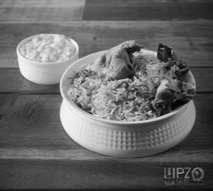 Chicken dum biryani with dahi raita