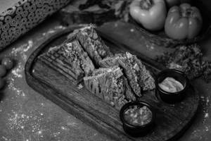 Grilled Italian Veggies And Paneer Fritters Sandwich In Focassia