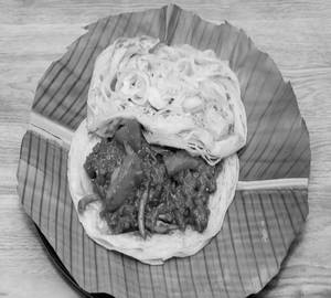 Mutton Kizhi Parotta