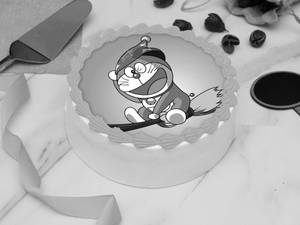 Doraemon On Flying Broom Stick Photo cake