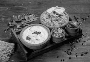 Curd Rice + Chettinad Vathakulambu Rice Bowl