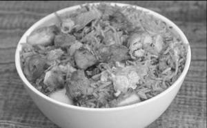 Triple Chicken Schezwan Fried Rice   