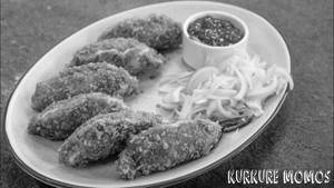 Paneer Chilli Gravy Momo's