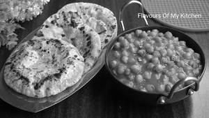 Chole + 2 Butter. Roti