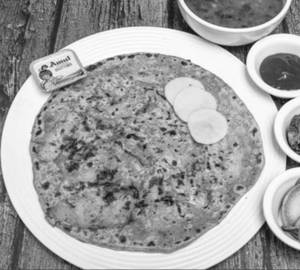 Aloo pyaaz parantha with yellow dal