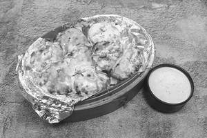 Veg Afghani Momos [8 Pieces]