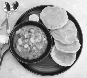 8 Puri + Aloo Tamatar + Pickle                                                   