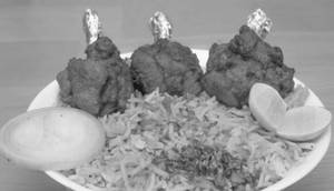 Chicken Biryani + 2 Pieces Lolipop