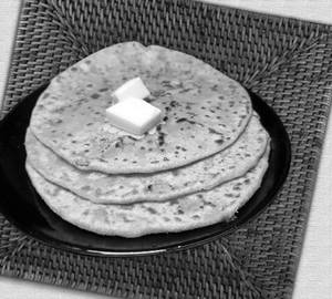 2 paneer Onion Paratha With Curd And Pickle